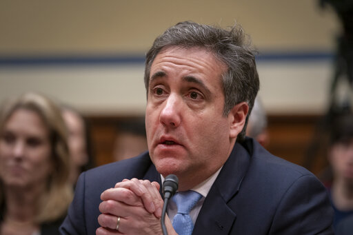 Michael Cohen, President Donald Trump's former personal lawyer, becomes emotional as he finishes a day of testimony to the House Oversight and Reform Committee, on Capitol Hill in Washington, Wednesday, Feb. 27, 2019. (AP Photo/J. Scott Applewhite)