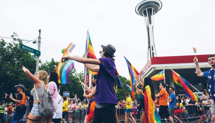 A+photo+of+a+Pride+Parade+in+Seattle+in+front+of+the+Space+Needle.