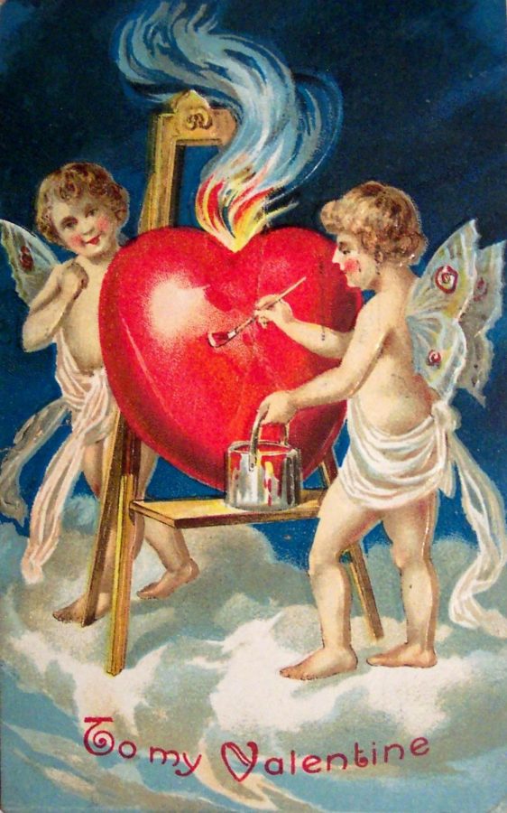 A+photo+of+two+cupids+painting+a+heart+red.