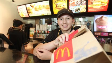 A student working at a Mcdonalds.