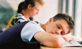 Image of a student sleeping during class