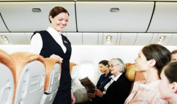 Cabin crew assistance during flight hours picture.