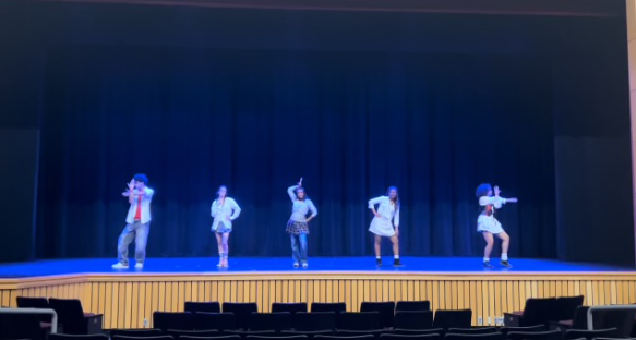 A picture of a group of students starting their performance