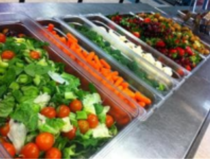 A picture of fresh vegetables that are provided with school lunches.