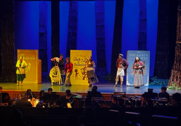 A photo of Cinderella, Jack, the Baker, and his wife all together, about to go into the woods.