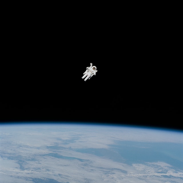 Picture of an astronaut floating in space.  Free download from NASA -
https://unsplash.com/photos/astronaut-in-spacesuit-floating-in-space-Yj1M5riCKk4.