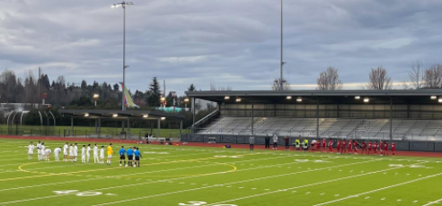 Renton Redhawks (in red) and the Highline Pirates line up at Renton Memorial Stadium.