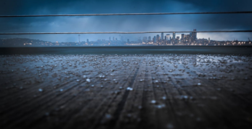 (A picture of rain on a deck in Seattle, overlooking the skyline).
Photo by Zoe Pappas: https://www.pexels.com/photo/photo-of-city-under-cloudy-sky-959813/. Free photo Google search.
