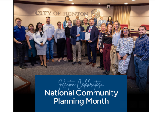 A photo of Renton city's council members with city planners.