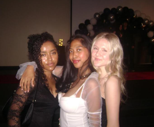 A photo of Hanna, Precious, and Maizey at the dance.