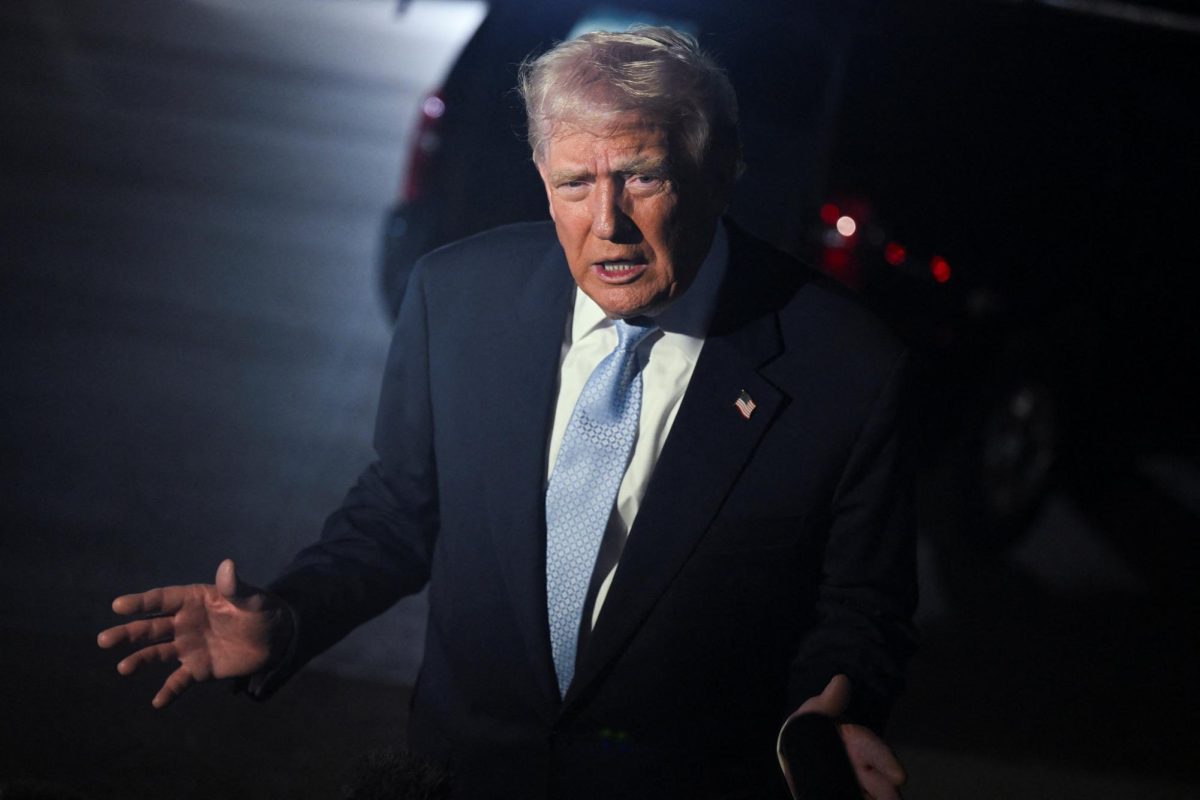 U.S. President Donald Trump speaks to the media as he boards Air Force One en route to Washington, at Palm Beach International Airport, in West Palm Beach, Florida, U.S., November 16, 2025. REUTERS/Annabelle Gordon