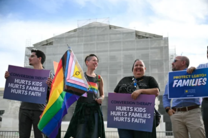 Demonstrators protest against Conversion Therapy outside the Supreme Court. (Andrew Caballero-
Reynolds / AFP via Getty Images.)