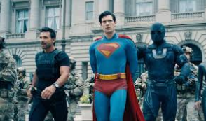Photo of Superman (David Corenswet) being arrested by Ultraman (Justin Howell: stunt double) and Rick Flag Sr. (Frank Grillo).
