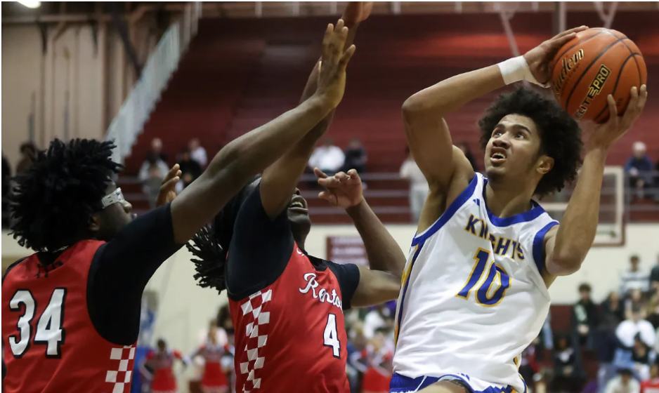 Photo of Renton’s Samson “Moose” Mullen and Nate Omar guarding Bremerton's Jalen Davis.