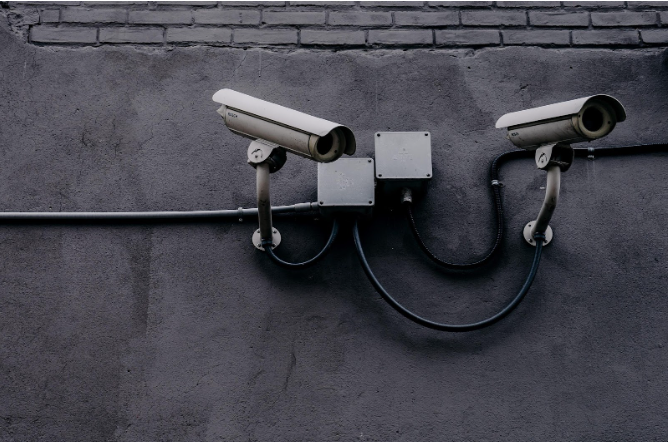 Picture of a security camera monitoring. Surveillance technology can help homeowners detect suspicious activity and report crimes quickly.