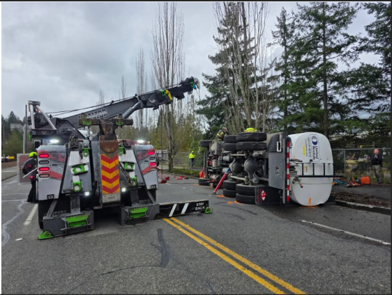 Photo of the water truck rolled over.