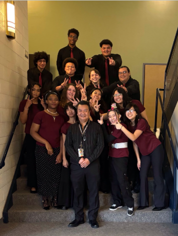 Photo of RHS A Cappella students with Mr. Lim.