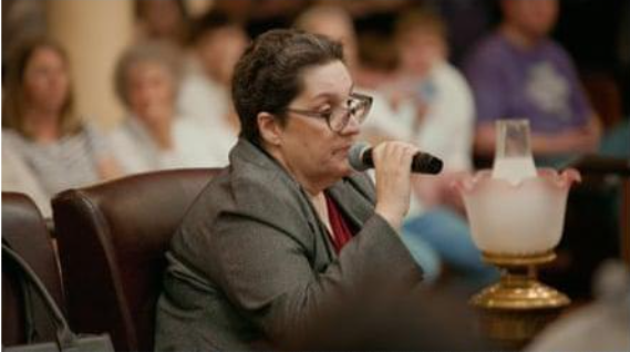Photo of Luanne James at a meeting of the Rutherford county library board in Murfreesboro, Tennessee. Photograph: Ryan Rehnborn/AP.