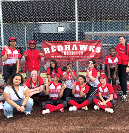 Photo of the girls' softball team after their win.
