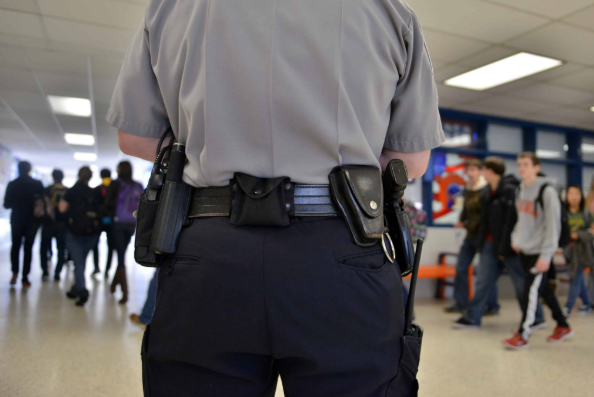 Photo of a police officer at a school.