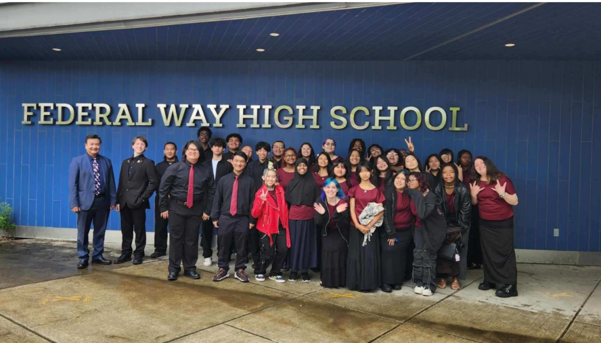 Photo of Professional RHS A Cappella students with Mr. Lim after Music Competition at Federal Way High School. (Photo Taken by: Ms. Stephanie, Dylan’s Blaylock mom.
