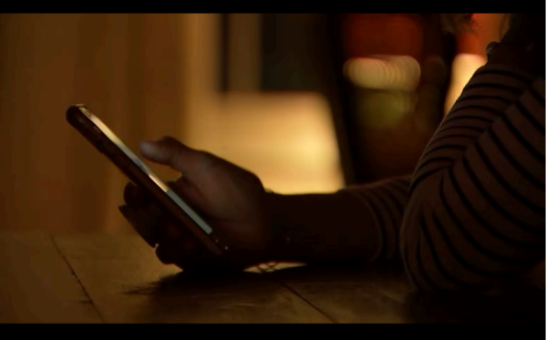 Photo of someone shopping on their phone.