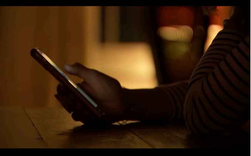 Photo of someone shopping on their phone.